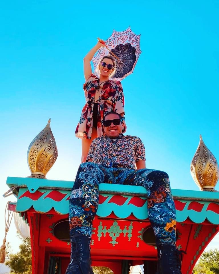 A guest with a parasol perched on top of Beautiful Engine
